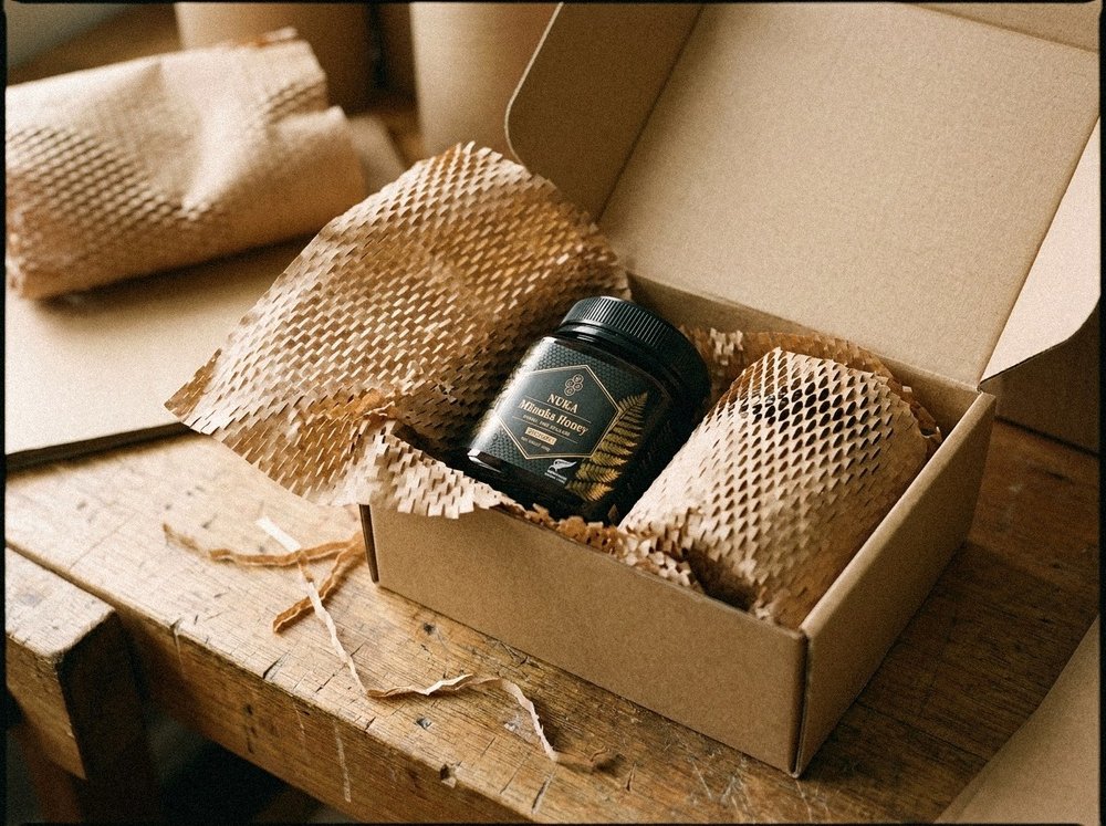 Nuka Mānuka Honey jar packed in protective wrap, ready for delivery